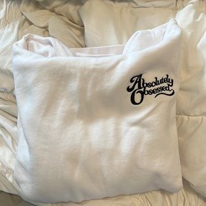 Rachel Ratke’s Absolutely Obsessed merch hoodie